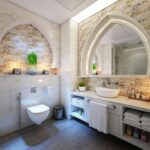 Elegant modern bathroom with marble tiles, ambient lighting, and stylish decor.
